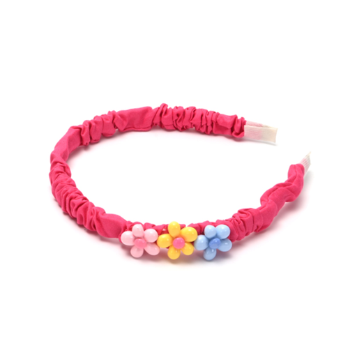 VINCHA CON APLIQUE DE FLORES COLOR LISO